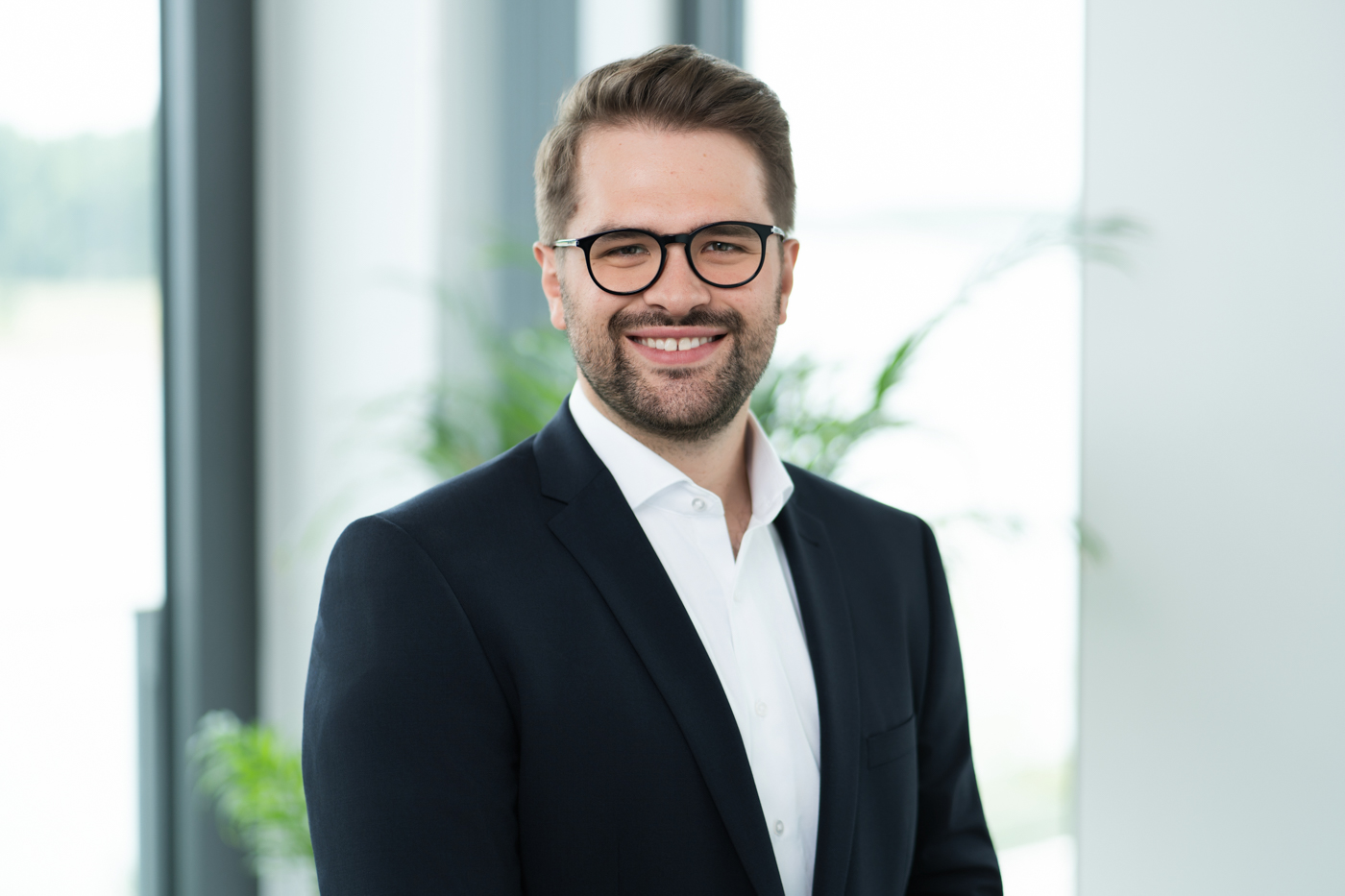 Einheitliches Team-Porträt aus einem Business-Shooting in Köln